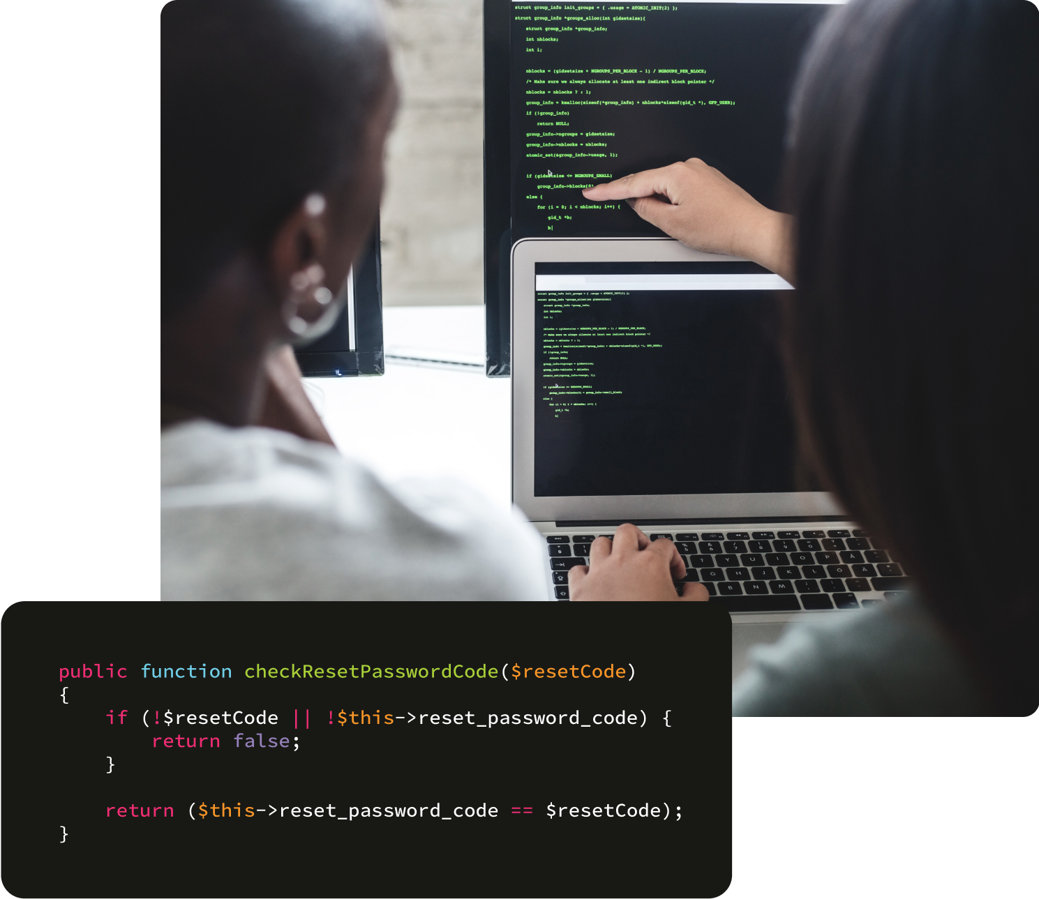两个人正在看电脑代码，访问网络安全。
